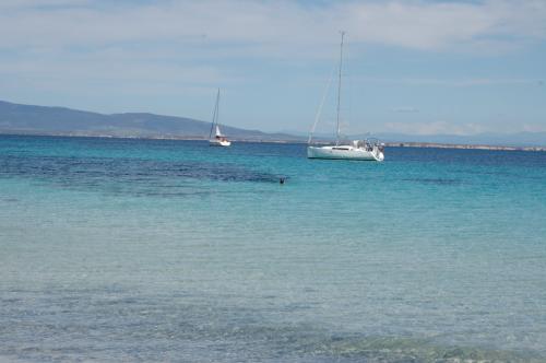 Sailboat in the crystal clear sea