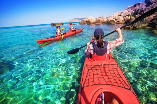 Rent canoe and hikers in the crystal clear sea of Bosa