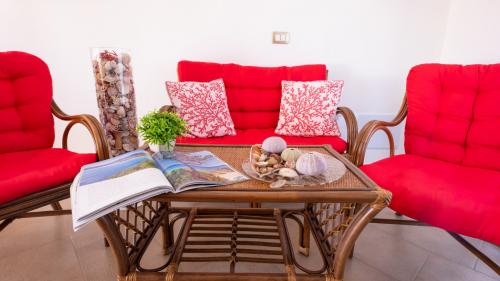 Zona relax del bed and breakfast a Bosa