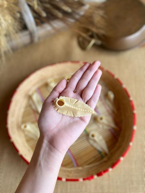 Hiker prepares traditional Sardinian pasta during a workshop with an expert guide