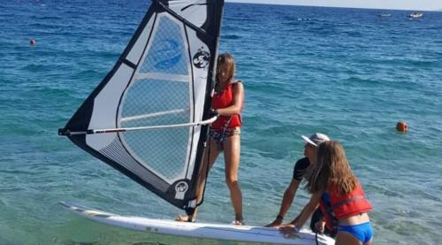 Sail and windsurf board in Sardinia