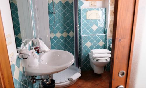 Bagno di mini appartamenti ad Alghero