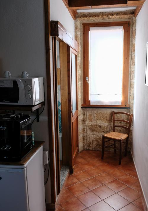 Cucina di mini appartamento ad Alghero