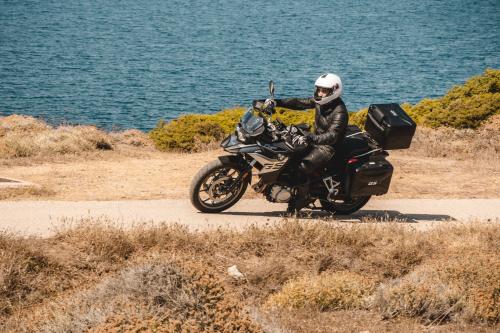 Motorbike curve on the coast road during tour in Sardinia