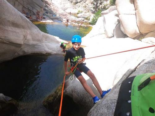 Child with equipment during guided canyoning