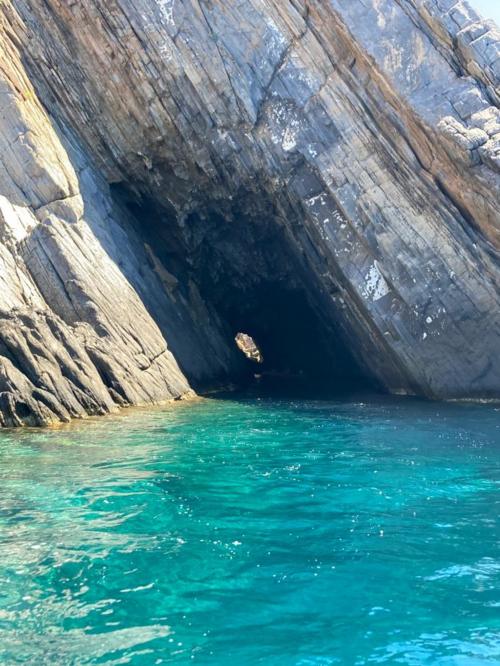Cave and turquoise sea