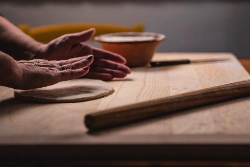 Guide prepares traditional pasta in a laboratory in Lollove