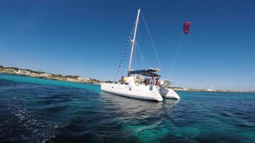 Catamaran in the turquoise sea between Sardinia and Corsica