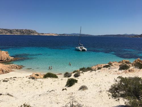 La Maddalena Archipelago and catamaran during daily tour with lunch