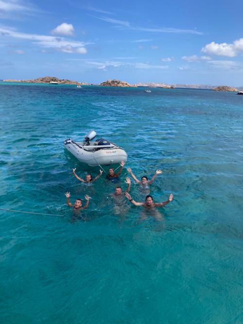 <p>Hikers during catamaran tours in the Archipelago of La Maddalena with tender to reach the beaches</p>