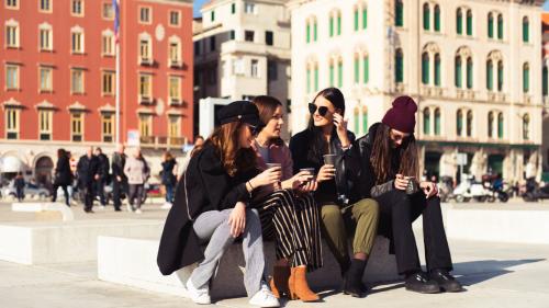 Hikers during escape experience through the streets of Cagliari