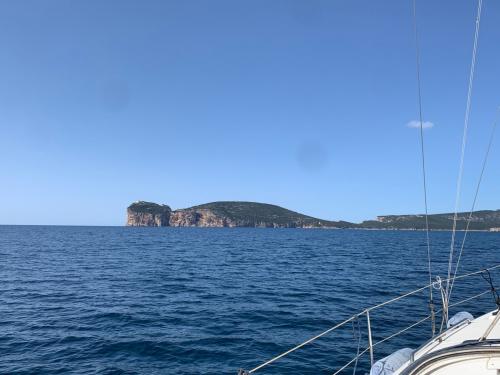 View of Capocaccia from a motor boat during tour