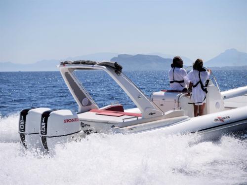 <p>Hikers aboard a luxury dinghy in the Archipelago of La Maddalena</p>