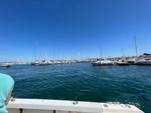 Exiting the port of Alghero by boat