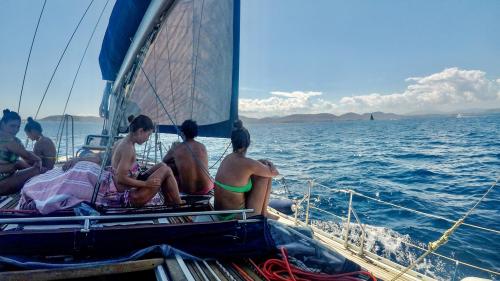 <p>Hikers aboard a sailing boat in the Protected Marine Area of Tavolara</p><p><br></p>