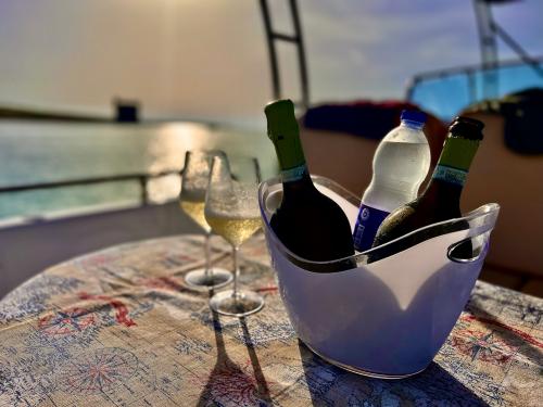 Sunset aperitif on board a boat in the Gulf of Asinara