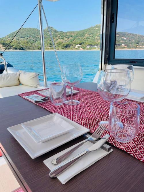 <p>Table set on a catamaran in Villasimius</p><p><br></p>