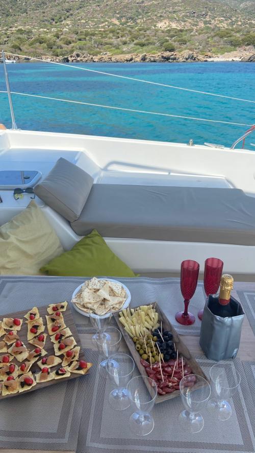 Aperitif and lunch aboard a catamaran in the Gulf of Asinara