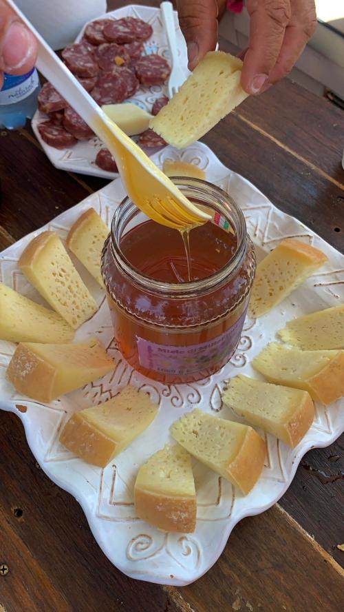 honey and local cheese snacks on the boat