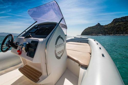 Inflatable boat in the crystal clear waters of Cagliari