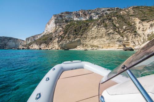 Inflatable boat in the crystal clear waters of Cagliari