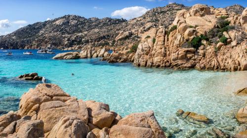 Crystal clear water in Caprera for snorkeling during boat tours