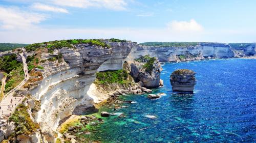<p>Blue sea and high cliffs in Corsica during boat tour with arrival in Bonifacio</p><p><br></p>