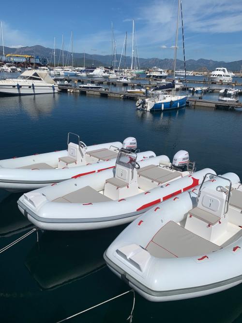 Rubber boats in the port of Arbatax