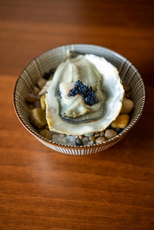 <p>Tapas in a bowl with caviar and oyster</p><p><br></p>