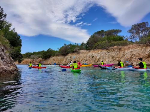 <p>Group of kayakers during a guided tour in the Oasis of Biderosa towards the sea</p><p><br></p>
