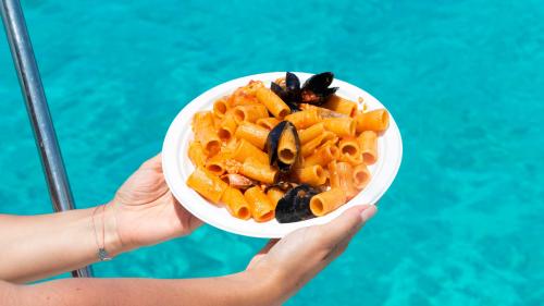 Pasta with seafood aboard the sailing boat Equinoxe