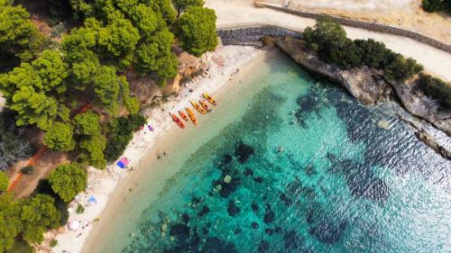 <p>Golfo Aranci coast, crystal clear sea and kayaks</p><p><br></p>