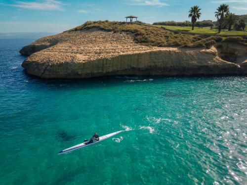 <p>Tourist kayaking in front of the beach of Balai</p><p><br></p>