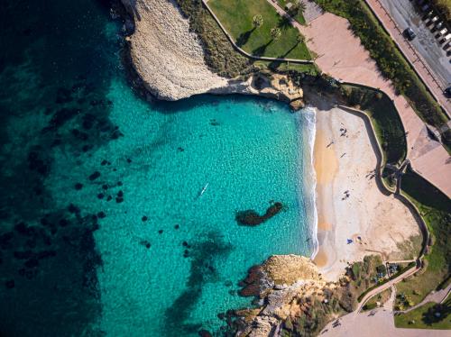 <p>Kayaking in the turquoise sea of Balai Bay</p><p><br></p>