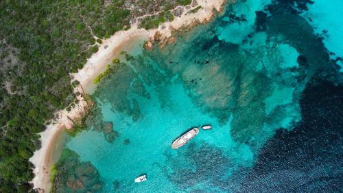 Motor vessel Apollo II stops off the coast of Budelli