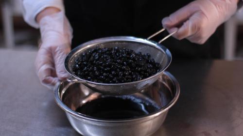 Straining of macerated myrtle berries