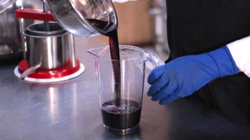 The extract is poured into a jug