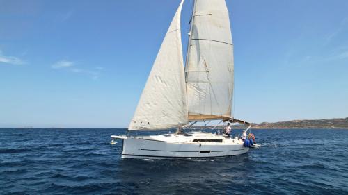 <p>Sailing boat in the turquoise sea in the Archipelago of La Maddalena</p><p><br></p>