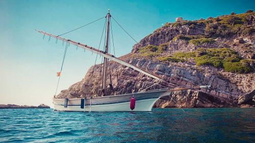 Historic sailboat in the Gulf of Alghero