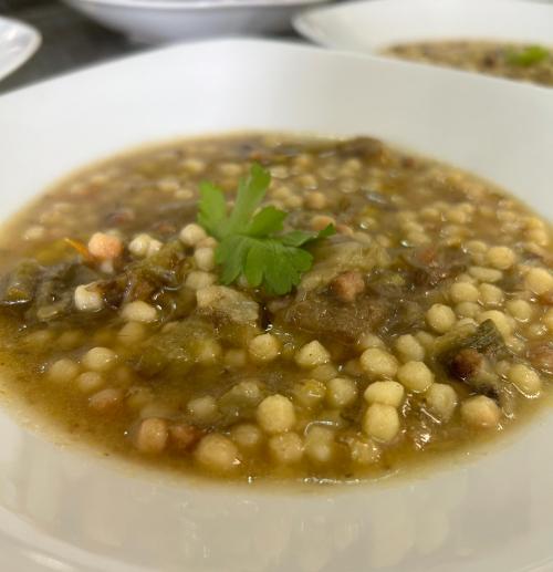 Broth with fregula served during degstation