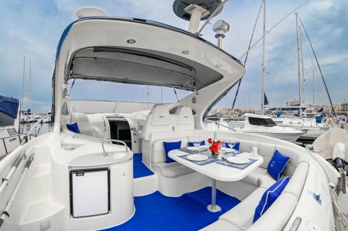 Sofas on a yacht in south-west Sardinia in which to relax during a day trip