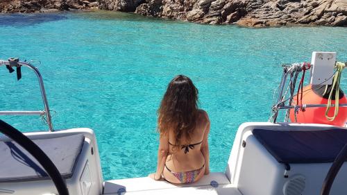 girl in the turquoise sea of the islands of the La Maddalena Archipelago National Park