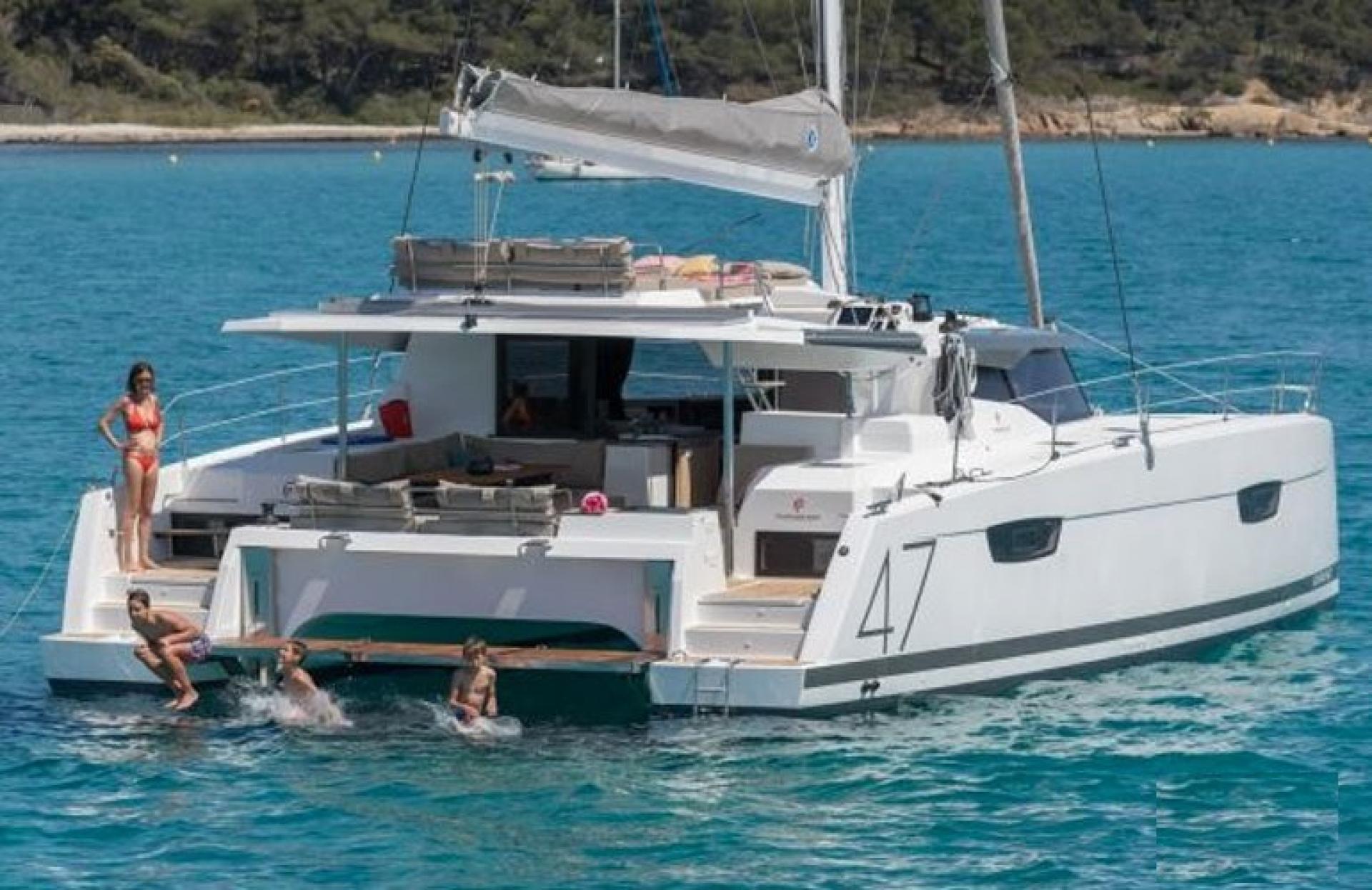 Fountaine Pajot extra luxury catamaran in the crystal clear turquoise waters of La Maddalena