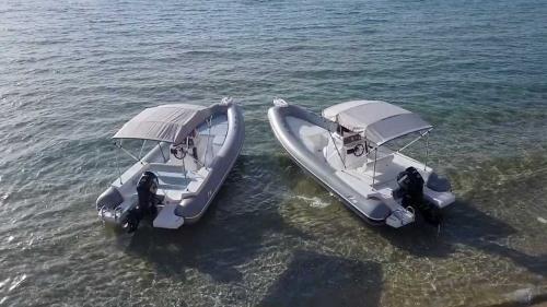 Inflatable boats in the shore of a beach