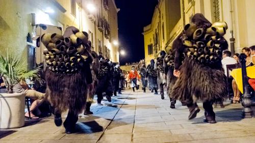 Mamuthones parade through the streets of Mamoiada