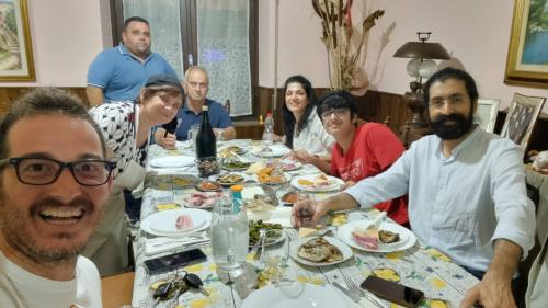 Tour participants have lunch at the home of a local family