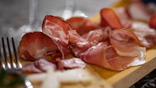 Cold cuts on the cutting board for tasting