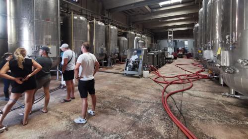 People visit a winery in the countryside of Alghero