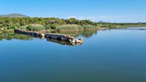 View of the Calich pond and the Roman punte in Alghero