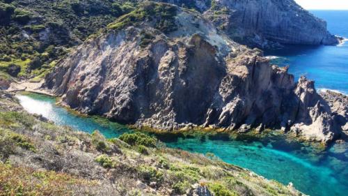 Cala Vinagra beach in Carloforte with crystal clear water